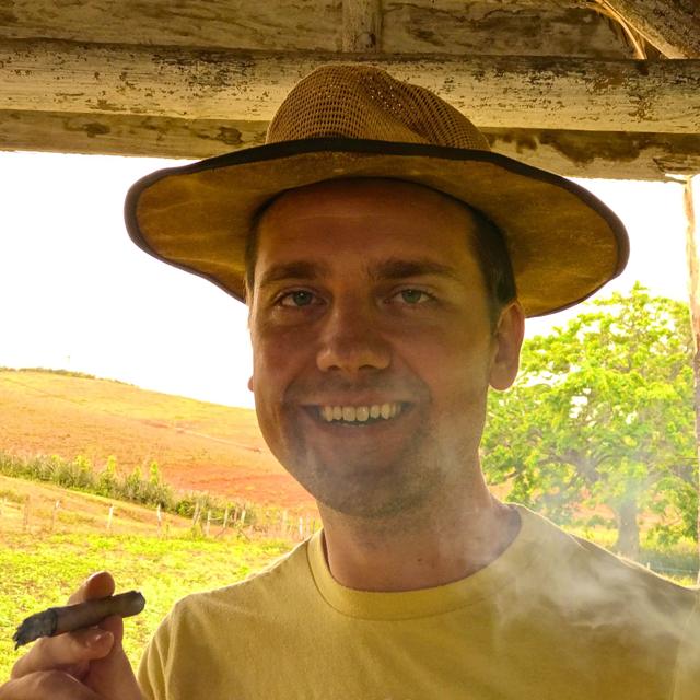 Stephen smoking a cigar in Vinales